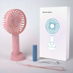 VENTILADOR DE MANO CON BASE Y PILA FS-1106